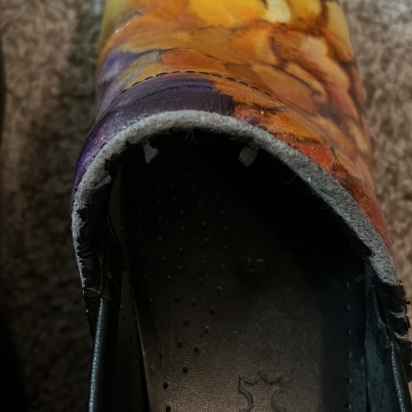 Two pairs of Dansko shoes one pair of Mary Jane the other are multi colored. - Picture 3 of 8